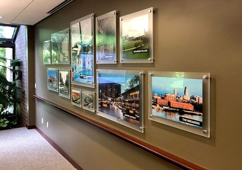 Frameless Acrylic Poster Displays Mounted on Standoffs | Nova Display Systems