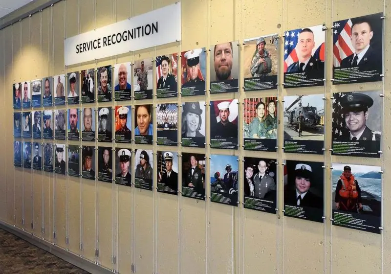 C1016 — Recognition Wall Display with Acrylic Photo Frames Suspended from Tension Cables